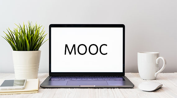 Image of a laptop screen with the text "MOOC"